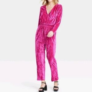 A New Day Women's Jumpsuit Velvet Long
Sleeve.    Color   Pink.   Size XS.  NWT